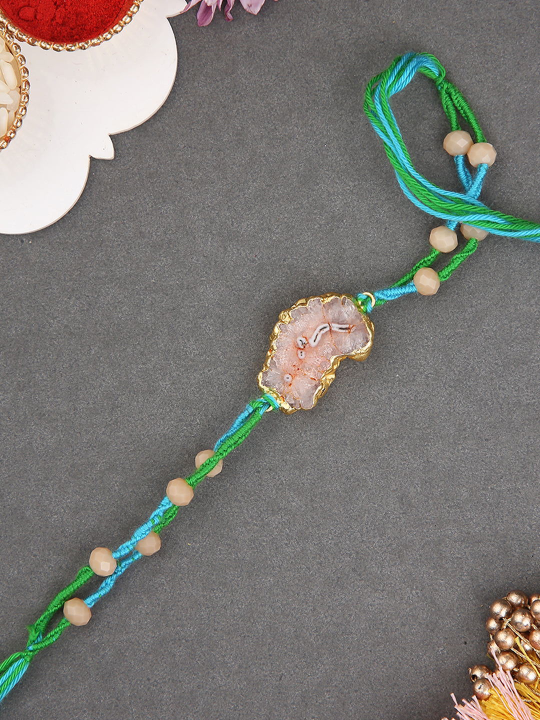 Handmade Stone Center Rakhi With Textured Dori And Natural Vibe Appeal