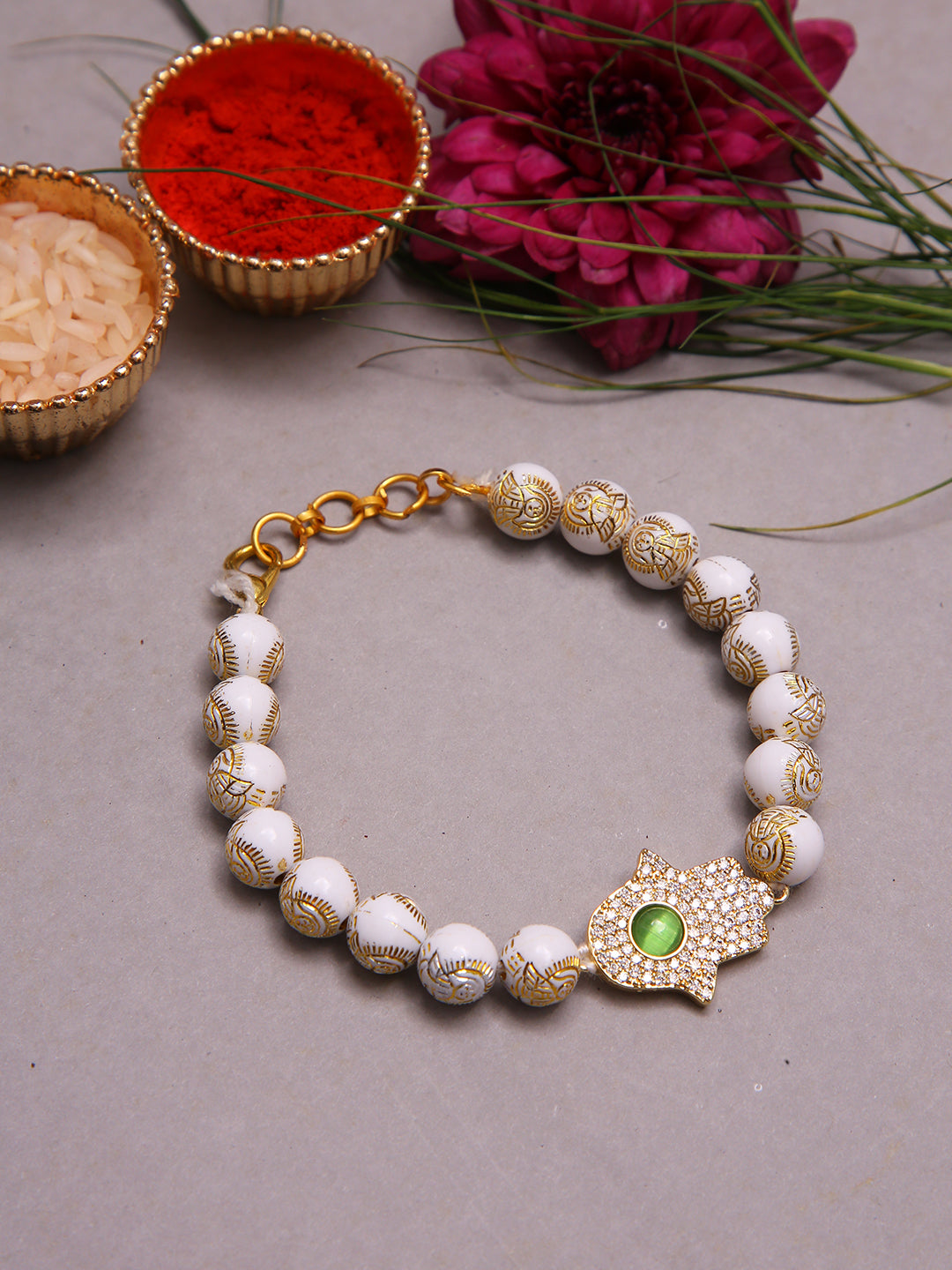 Handcrafted Protective Hamsa Rakhi With Pearl Finish Beads And Healing Stone