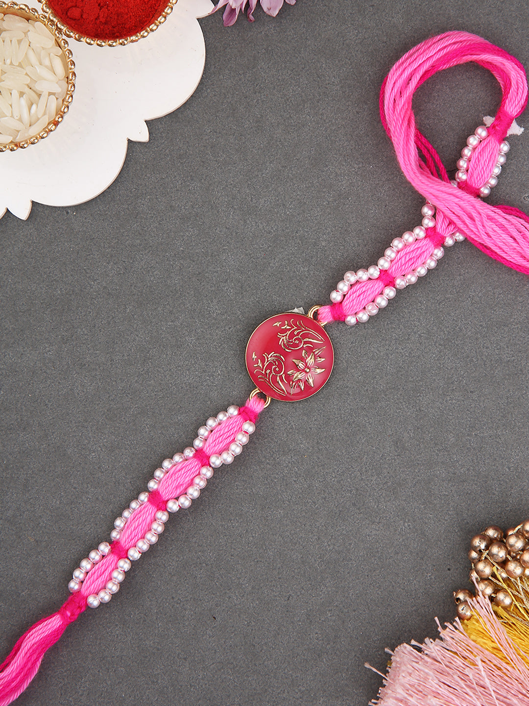 Handcrafted Shree Motif Rakhi with Ornate Threadwork in Pink