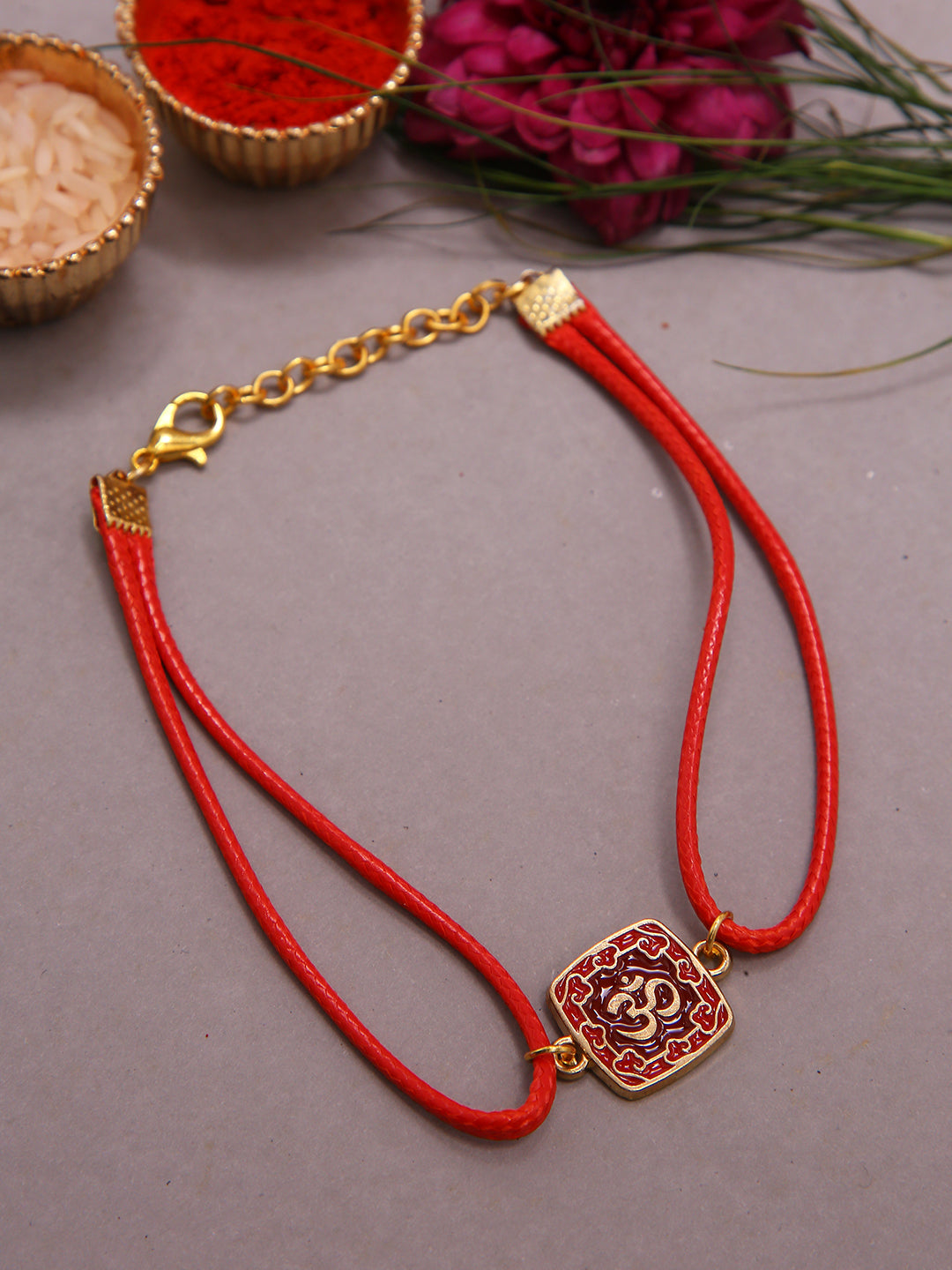 Traditional Om Designer Rakhi With Dual Red Cord And Enamel Finish Motif