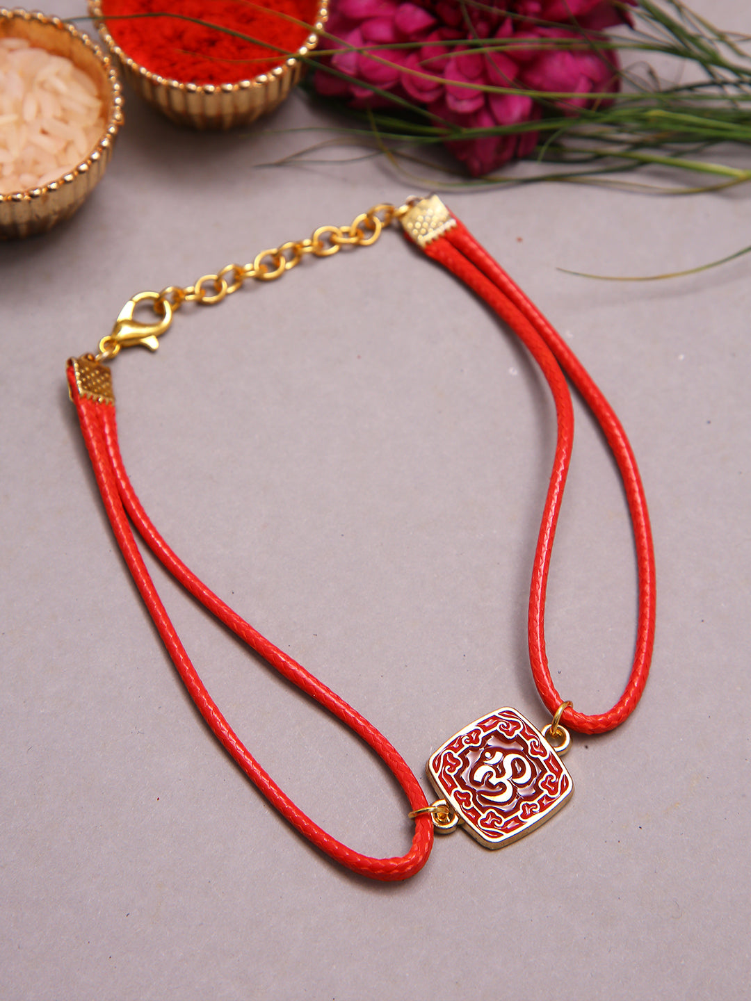 Traditional Om Designer Rakhi With Dual Red Cord And Enamel Finish Motif