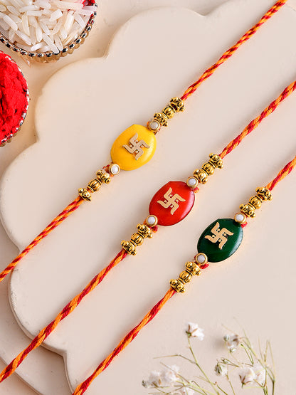 Handcrafted Swastik Rakhi Trio in Festive Red, Yellow & GREEN Mauli Thread