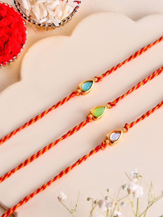 Subtle Kundan Rakhi Set of 3 with Teardrop Stone Design