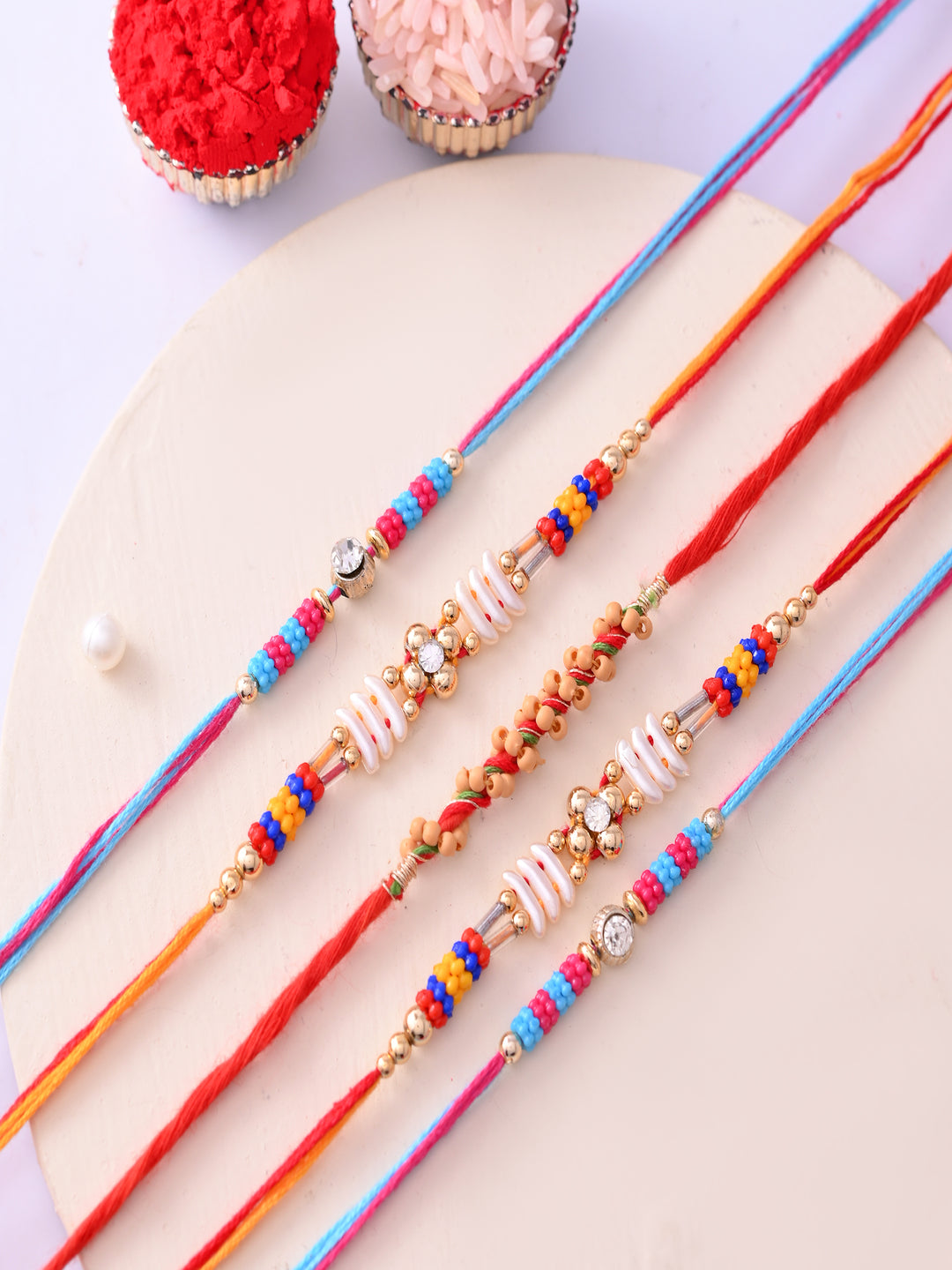 Set of 5 Multicolor Beads and Thred Rakhi