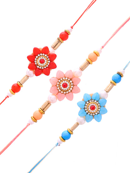 Vibrant Floral Rakhi Set of 3 for Brother with Red Pink Blue Accents