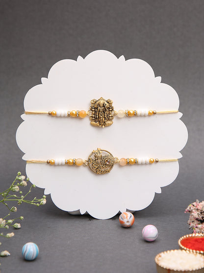 Antique God Symbol Rakhi Set with Divine Detailing and Pearl Beads