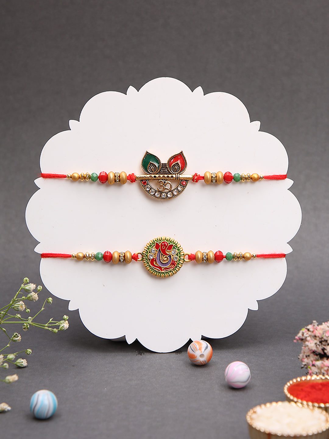 Handcrafted Rakhi Combo with Sacred Symbols and Festive Colour