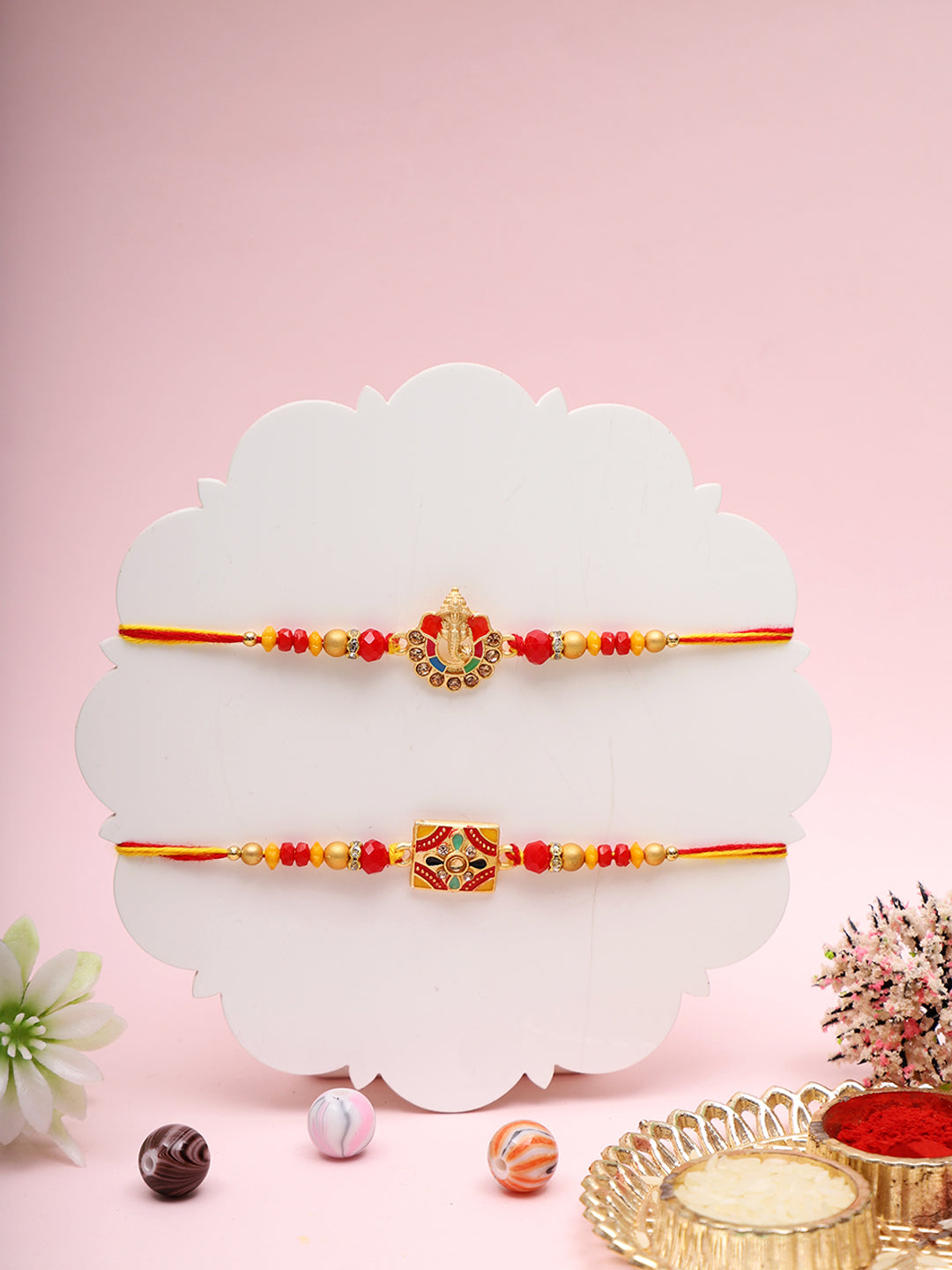 Divine Red Rakhi Combo with Symbolic Motifs and Ethnic Beads