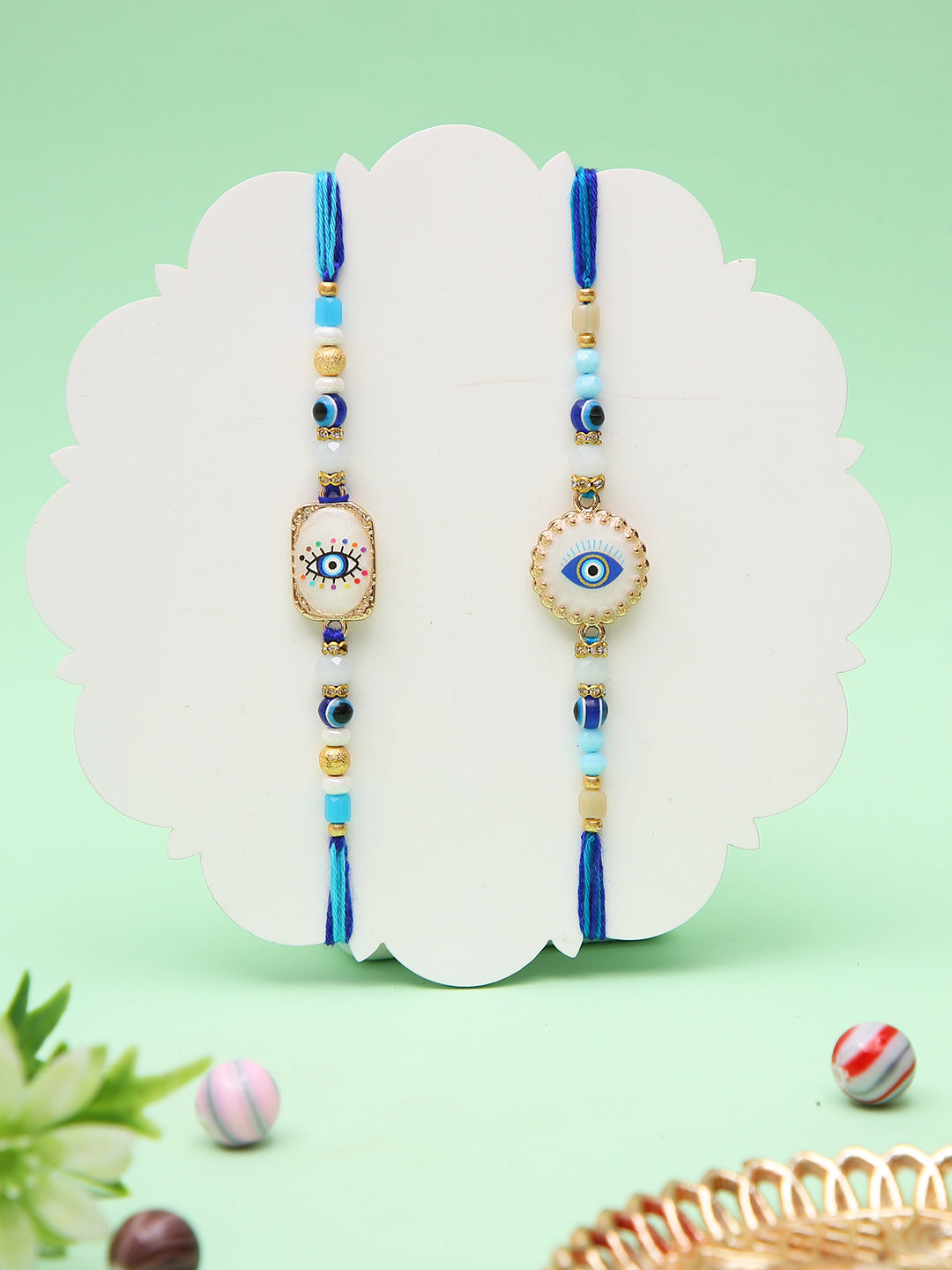 Elegant Evil Eye Rakhi Set With Designer Blue Thread And Tassel Finish
