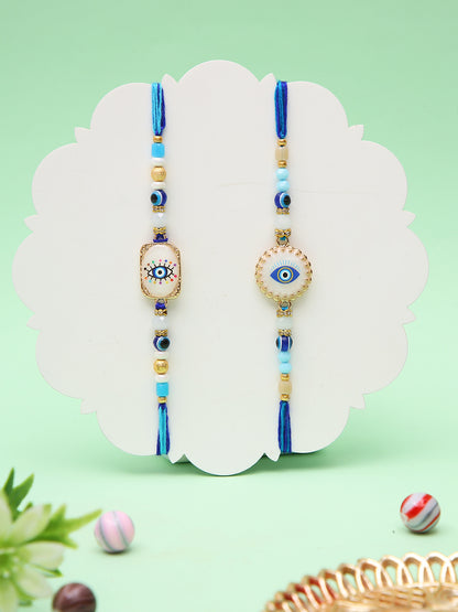 Elegant Evil Eye Rakhi Set With Designer Blue Thread And Tassel Finish