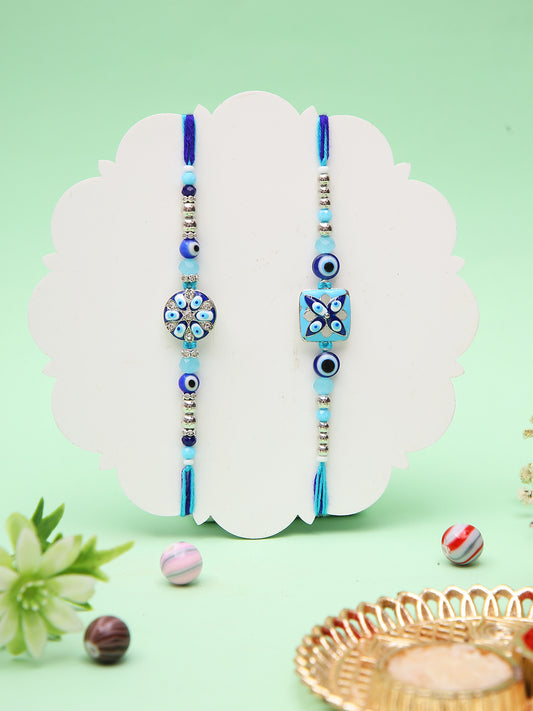 Handcrafted Evil Eye Rakhi Combo With Blue Floral And Mosaic Centerpieces