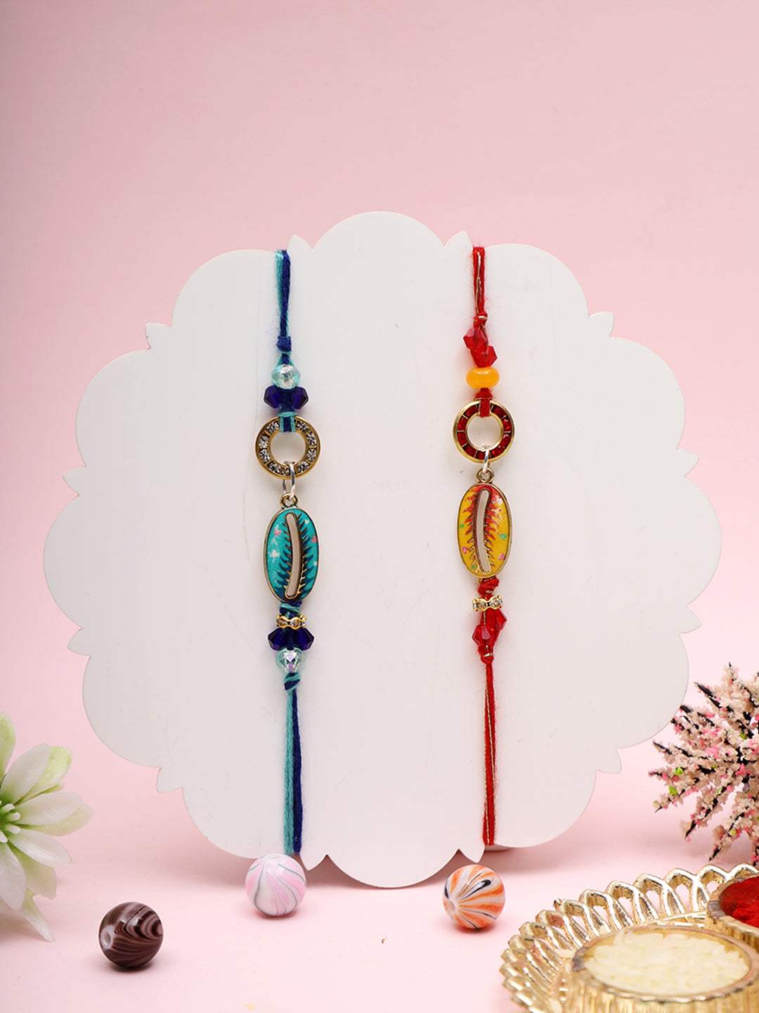 Handcrafted Rakhi Set with Ethnic Cowrie Shell Design and Vibrant Colours