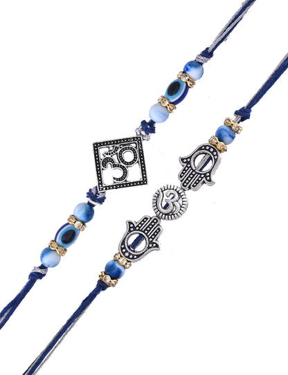 Set of two blue Rakhis, one with a Om symbol, and another with Hamsa hands,