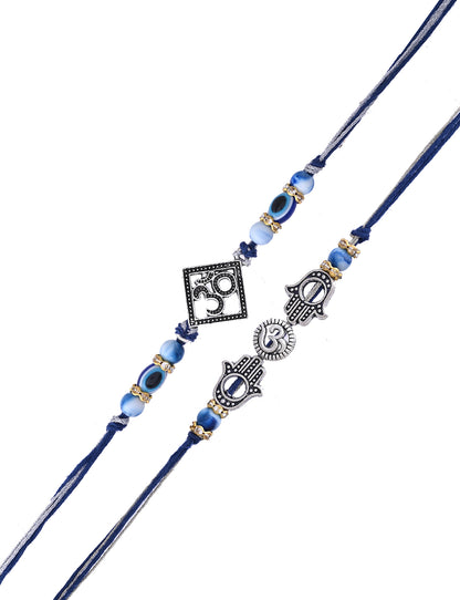 Set of two blue Rakhis, one with a Om symbol, and another with Hamsa hands,