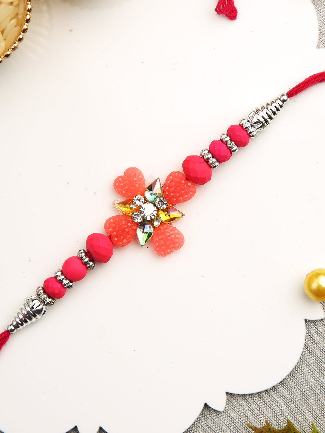 Blue & Pink Beads Studded Floral Shape Rakhi