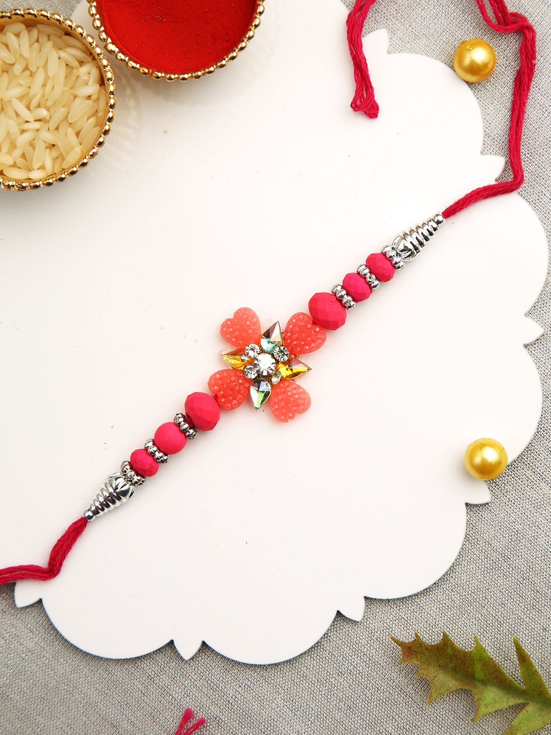 Blue & Pink Beads Studded Floral Shape Rakhi