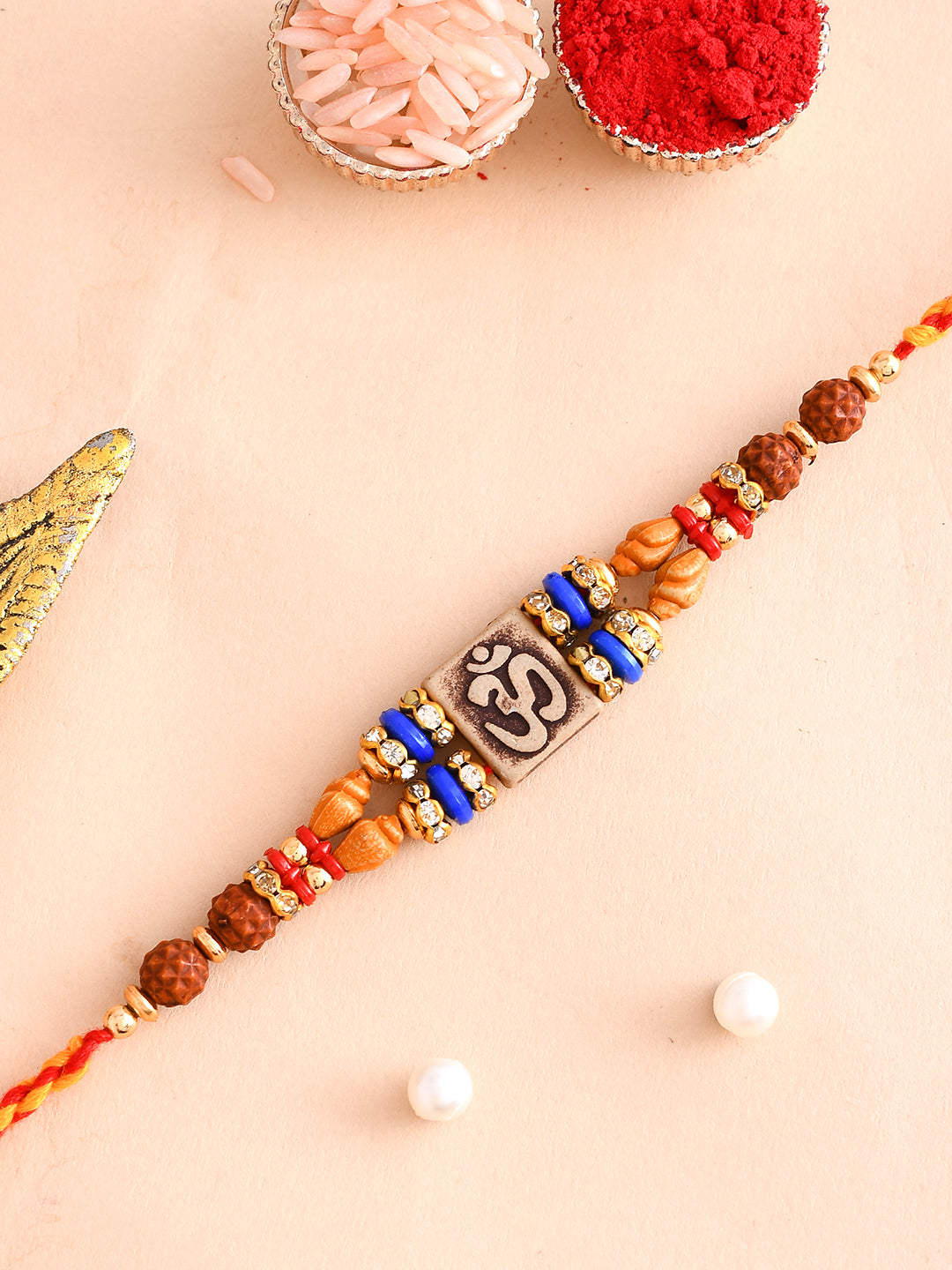 Quadra Rudraksh Studded Om Motif Rakhi