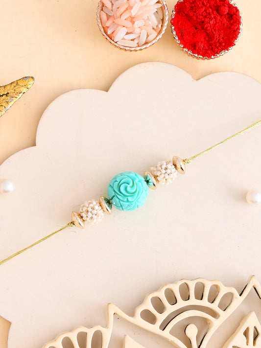Turquoise Coral Rakhi with  Balls