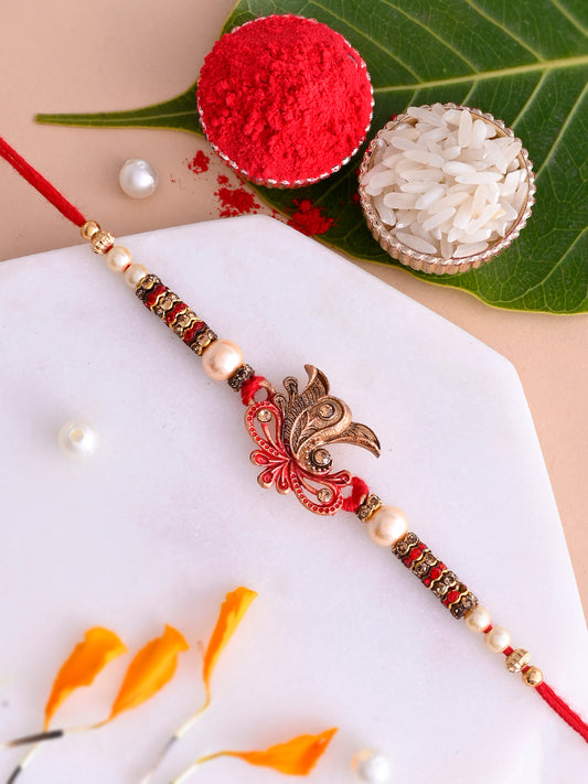 Ganapati Rustic Finish with Pearls and Golden Rings Rakhi