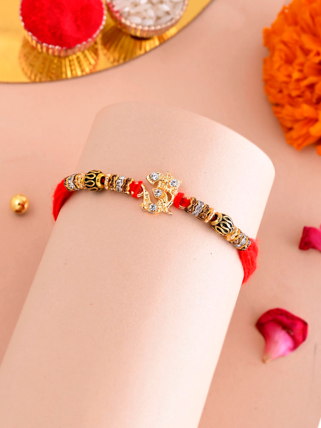 Stone Studded OM Motif Rakhi