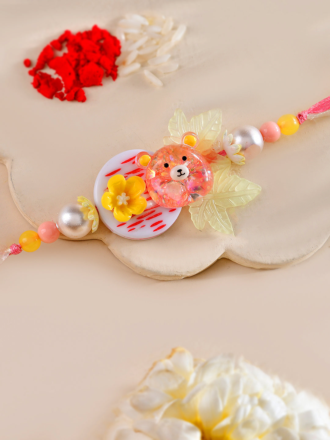 Adorable Teddy Bear Rakhi for Kids with Floral Detailing