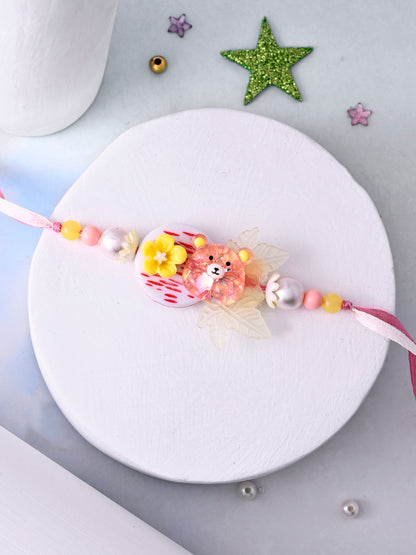 Adorable Teddy Bear Rakhi for Kids with Floral Detailing