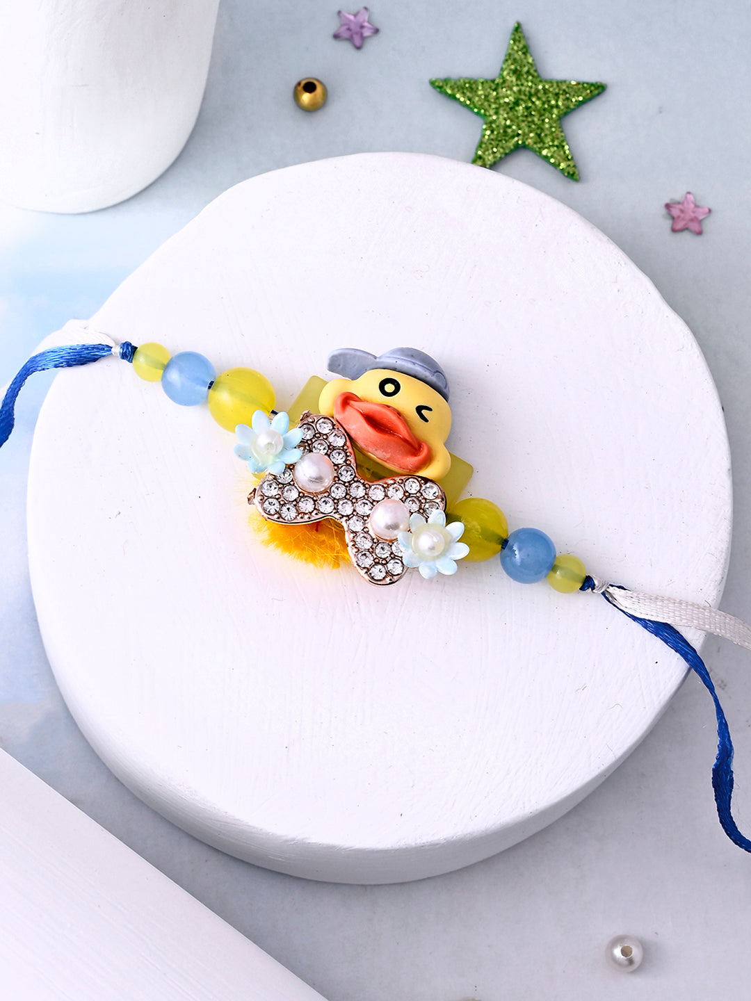 Winking Duck Kids Rakhi with Blue Cap and Crystal Bow Tie