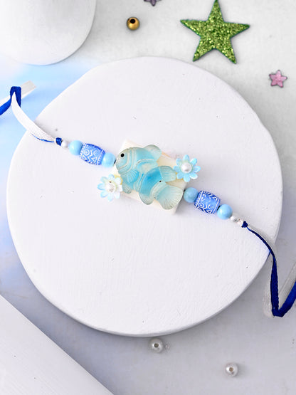 Aqua Fish Kids Rakhi with Blue Beads and Pearl Flowers