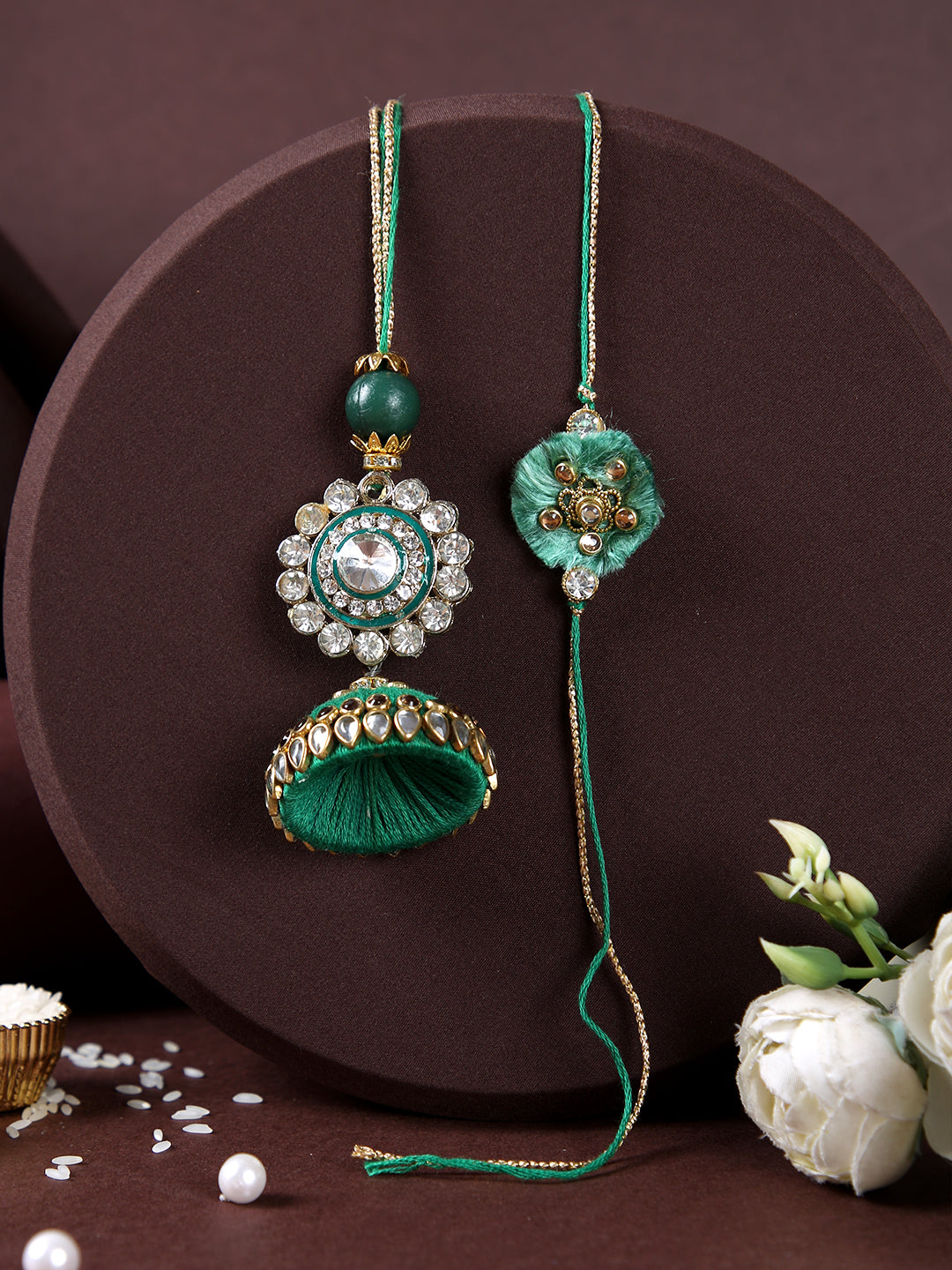 Auspicious Golden Flower with Green Dome Shaped Lumba Bhaiya Bhabhi Rakhi Set