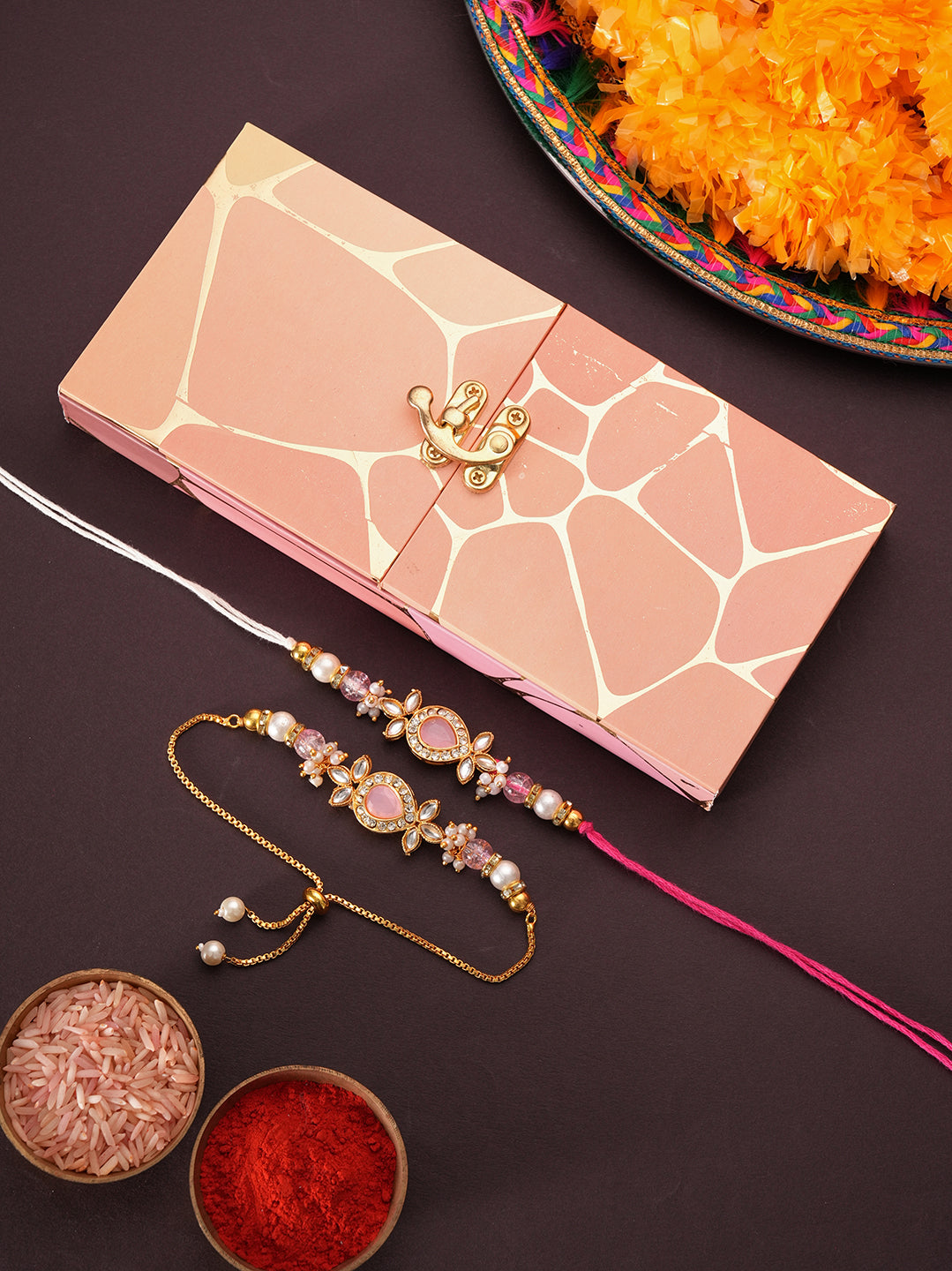 Pink Floral Bhaiya Bhabhi Rakhi with Sweet Box