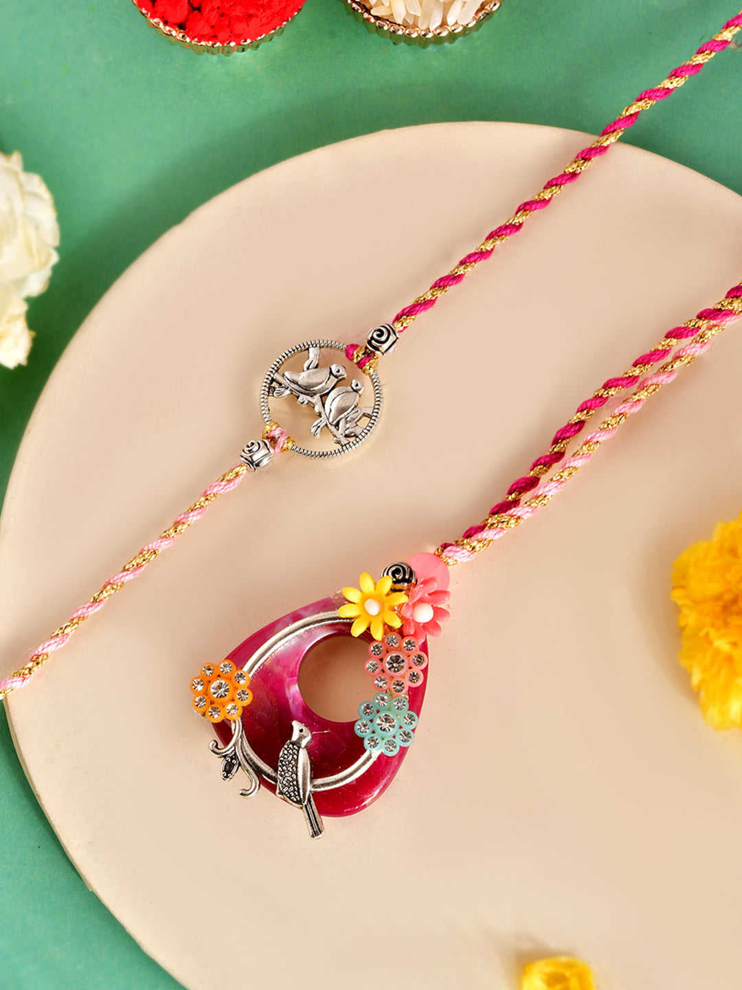 Handpicked Silver Charm and Red Floral Bhaiya Bhabhi Rakhi Set