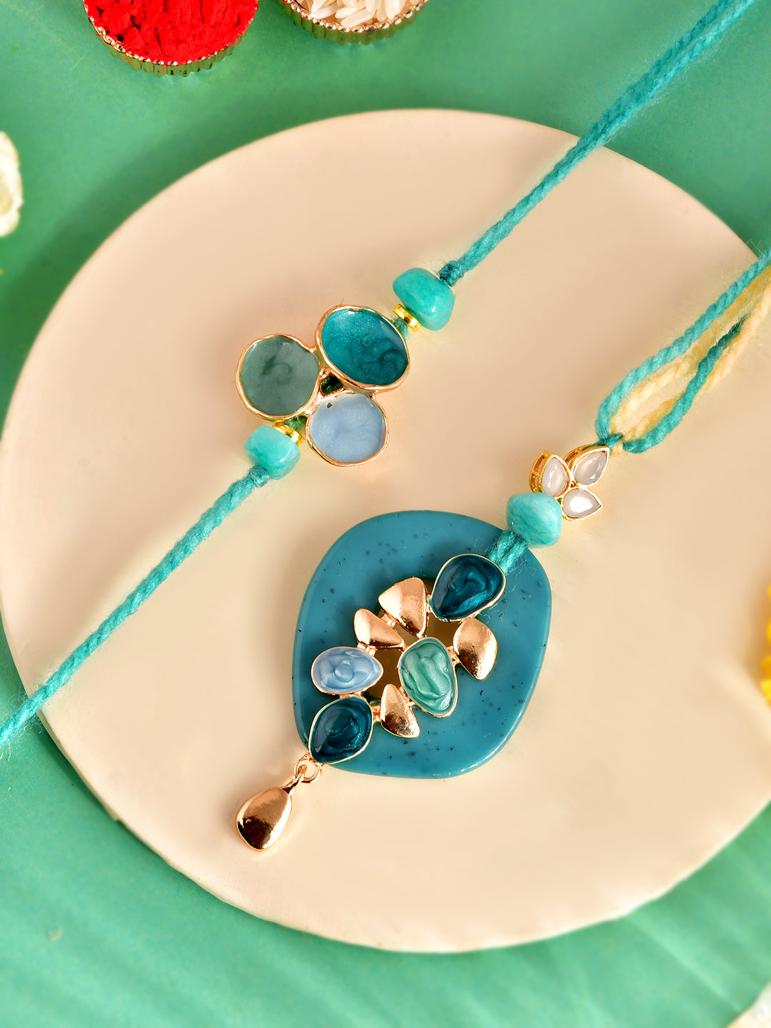 Handpicked Aqua Charm Rakhi Set for Bhaiya and Bhabhi