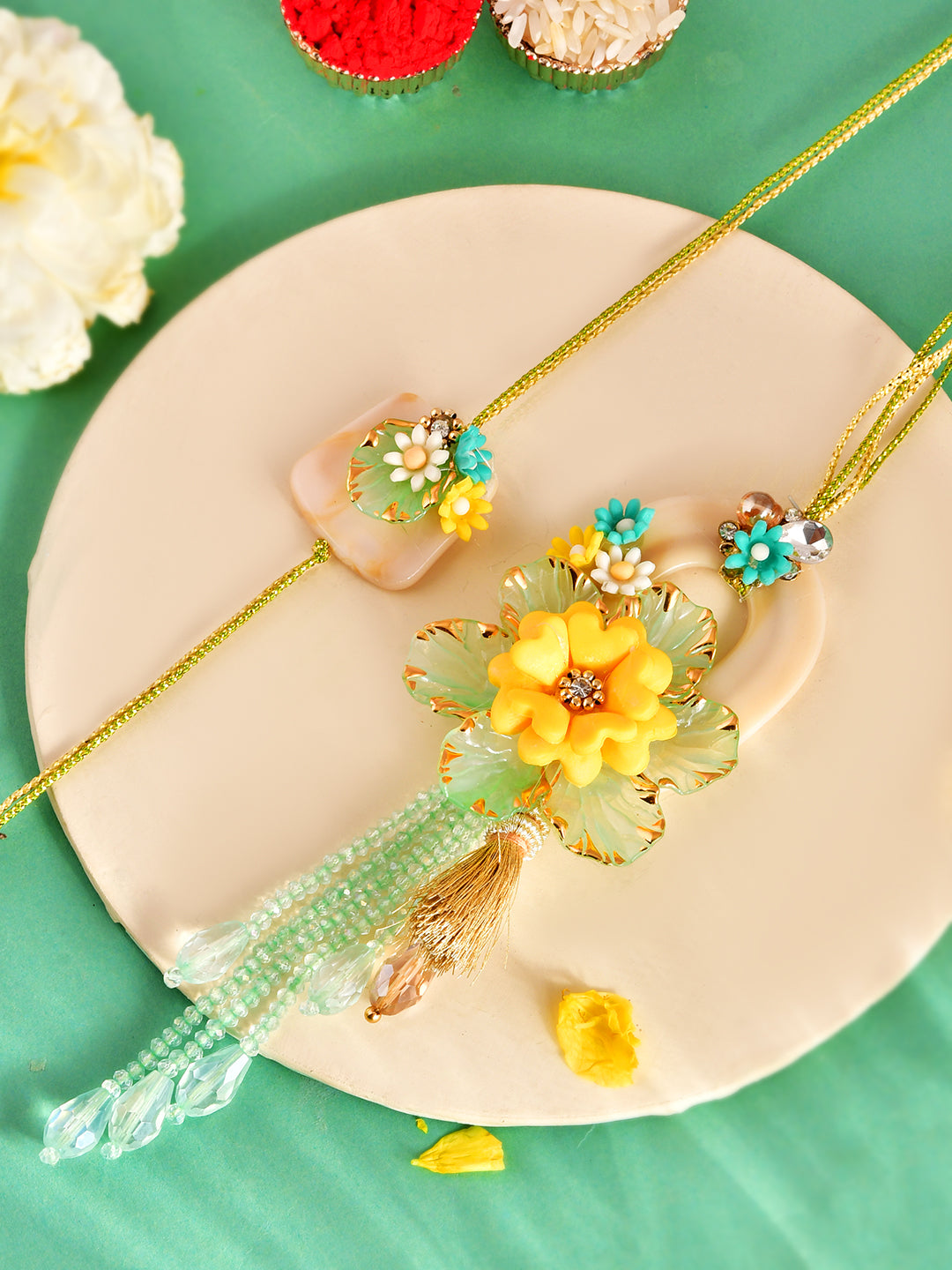 Elegant Handpicked Pearl Drop Flower Rakhi for Bhaiya Bhabhi with Box