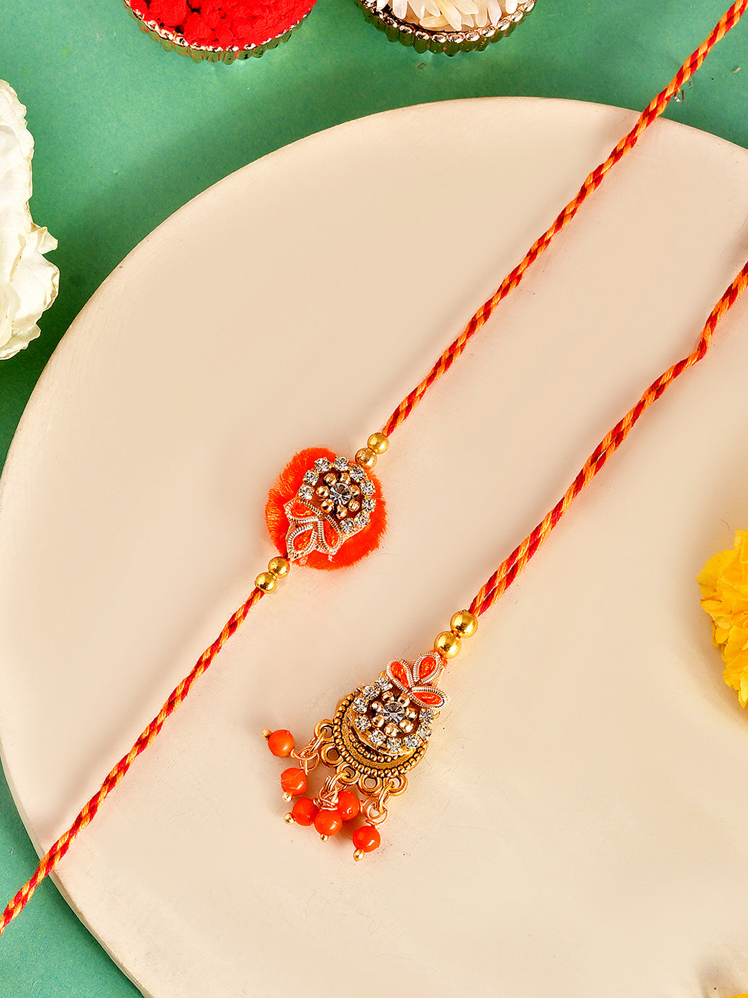 Handcrafted Traditional Rakhi Set for Bhaiya and Bhabhi with Orange Accents with Box