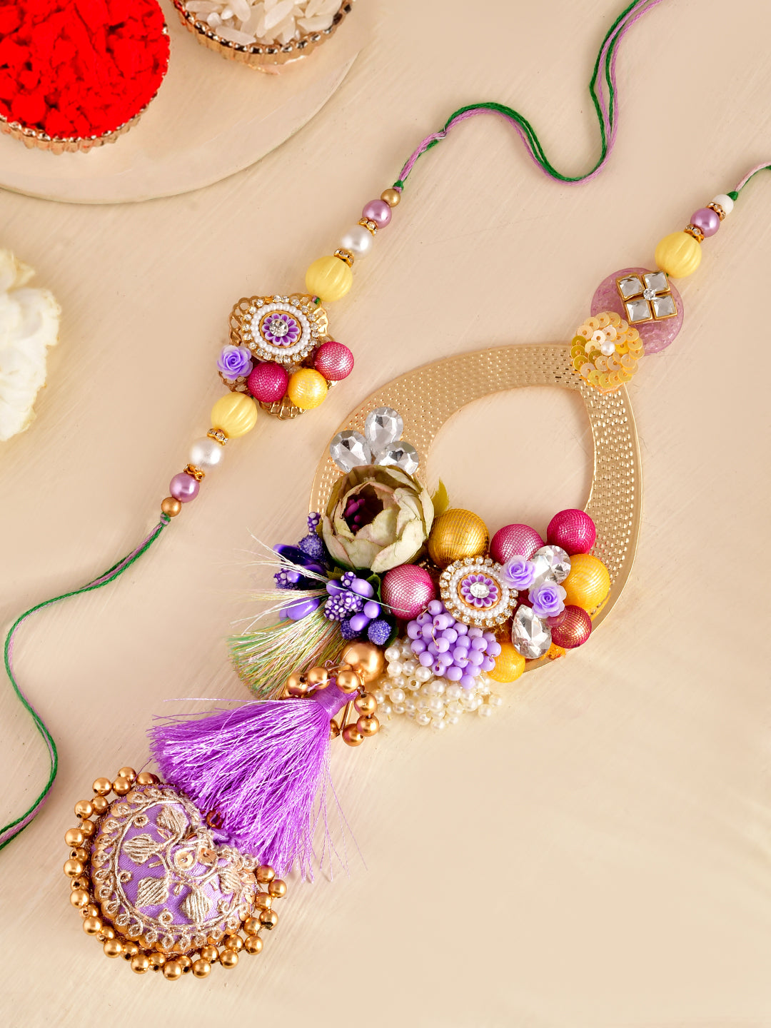 Royal Heritage Bhaiya Bhabhi Rakhi Set with Zardosi Embroidery and Beads