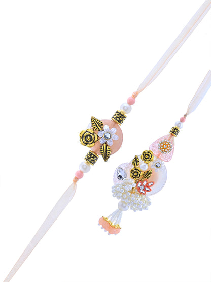 Elegant Peach Bhaiya Bhabhi Rakhi Set with Pearl Tassels and Golden Rose Work