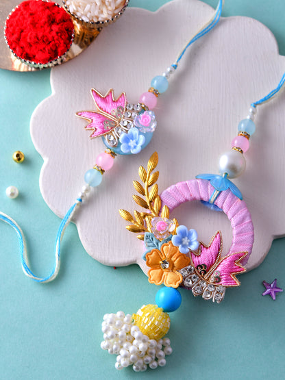 Pastel Blue Bhaiya Bhabhi Rakhi Set with Pearl Drops and Artistic Detailing
