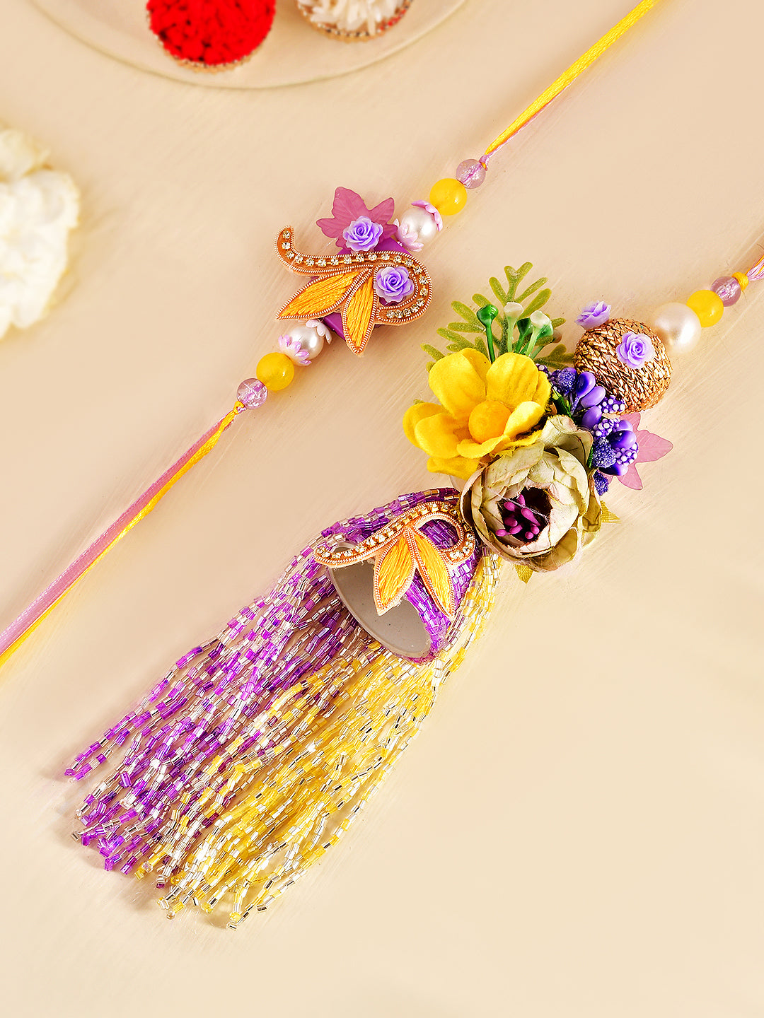 Purple Royale Bhaiya Bhabhi Rakhi Set with Golden Bell and Long Tassels