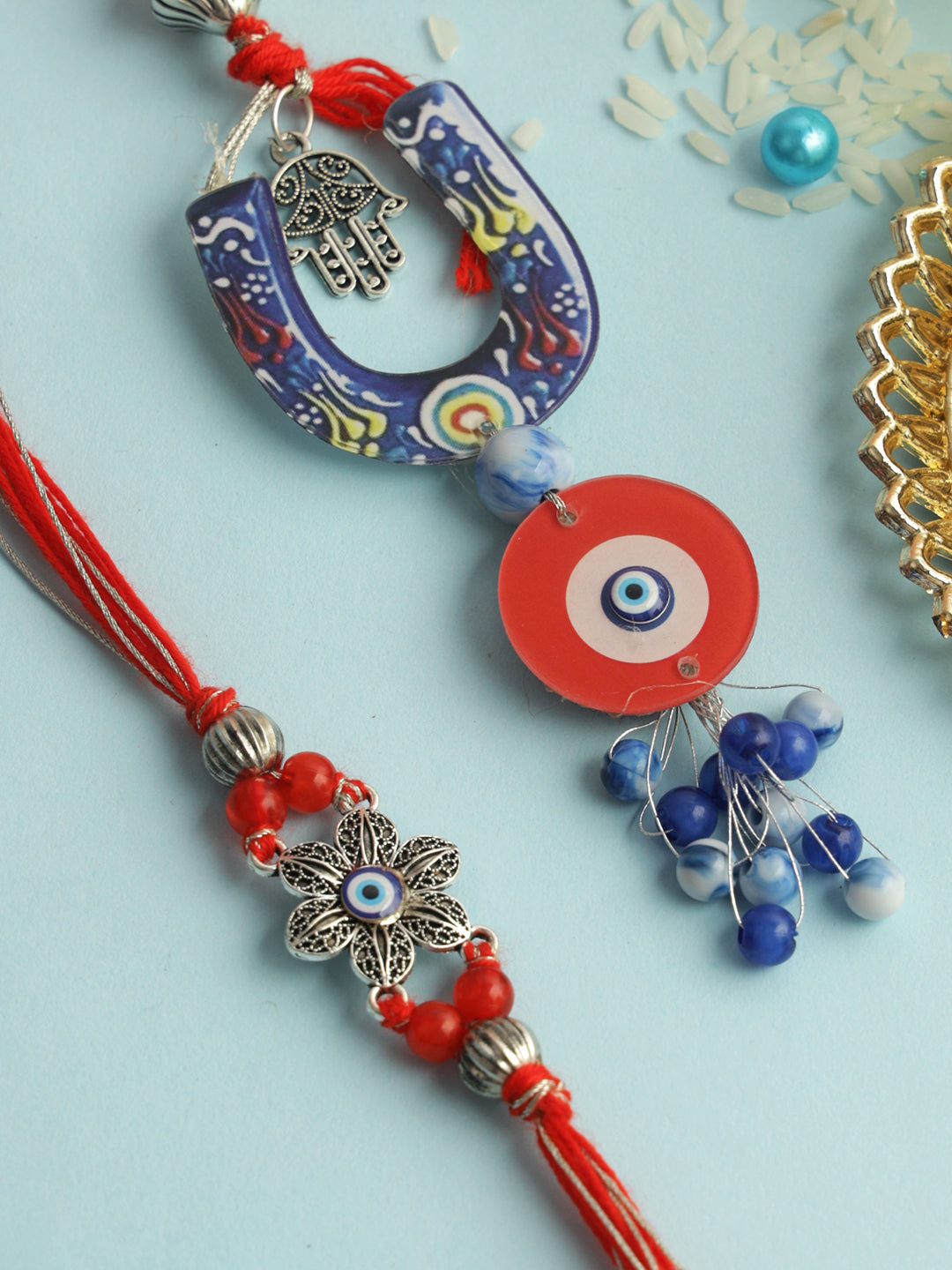 Red & Blue Floral Evil Eye Bhaiya Bhabhi Rakhi