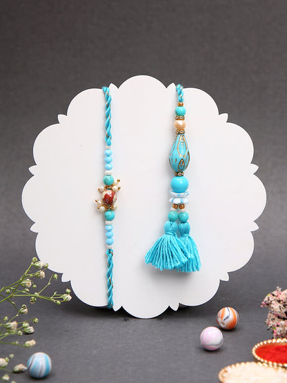 Handcrafted Rakhi Set with Blue Threadwork and Teardrop Beads