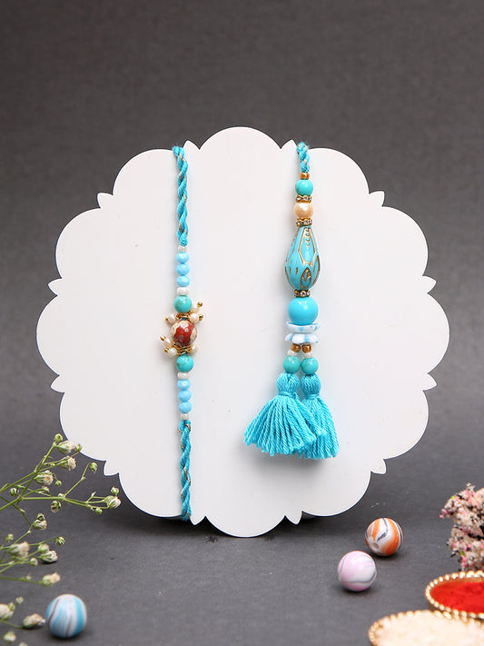 Handcrafted Rakhi Set with Blue Threadwork and Teardrop Beads