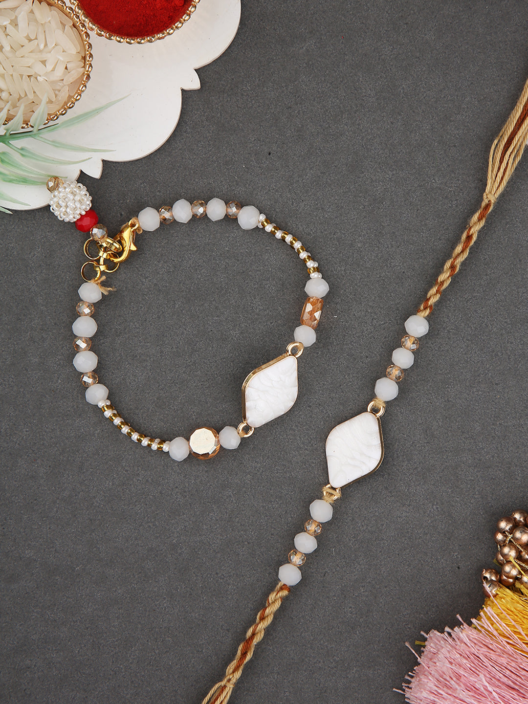 Bhaiya Bhabhi Rakhi Set With Ivory Stone Motifs And Gold Embellished Thread