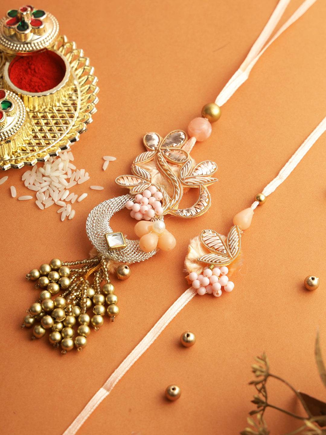 Pink Pearl Embellished Rakhi Set