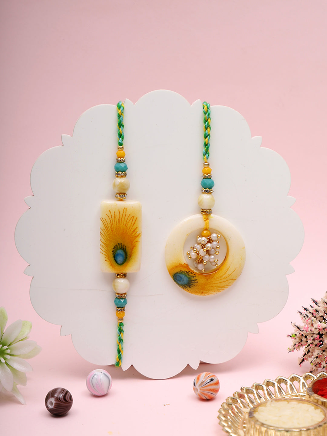 Peacock Feather Resin Rakhi Set with Ganesh Thali