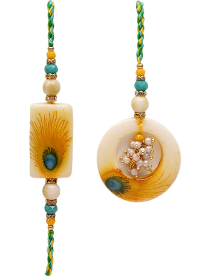 Peacock Feather Resin Rakhi Set with Ganesh Thali