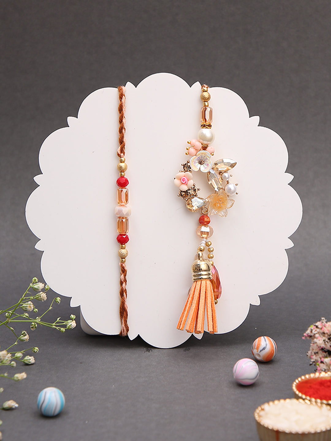 peach-pink Rakhi duo with Elegant golden thali