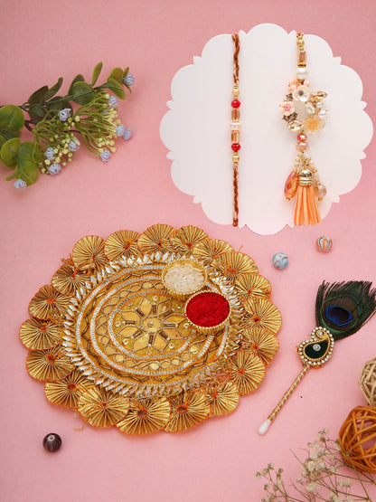 peach-pink Rakhi duo with Elegant golden thali