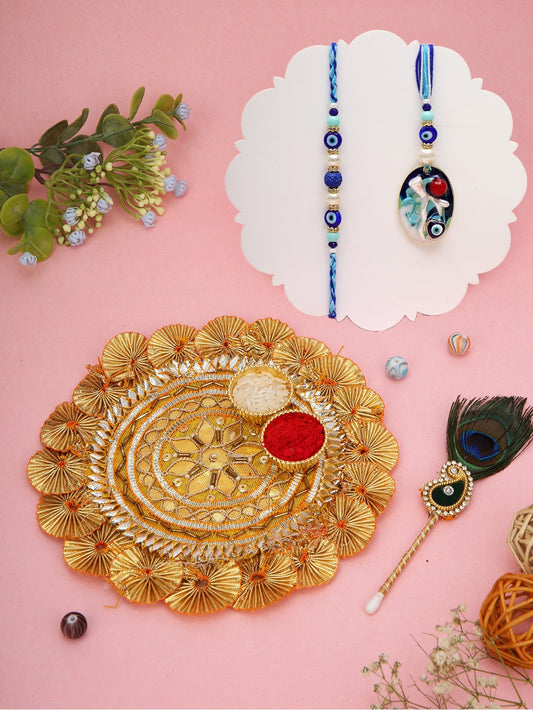 Evil eye Rakhi set with a golden designer thali