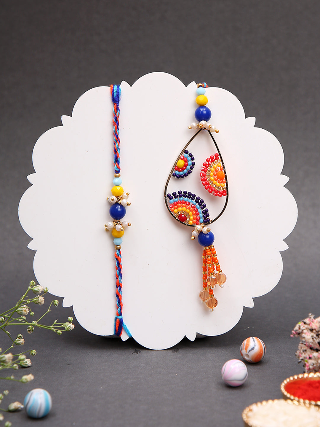 Colorful drop Rakhi and braided band with gold thali