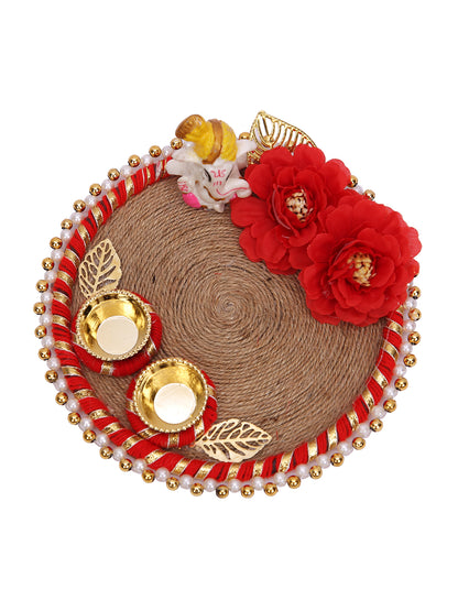 Soft-toned Rakhi set with peach accents and jute thali